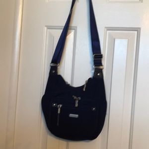 Baggallini navy blue purse with multiple zipper pockets excellent condition